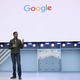 A photo of Sundar Pichai on stage at Google I/O